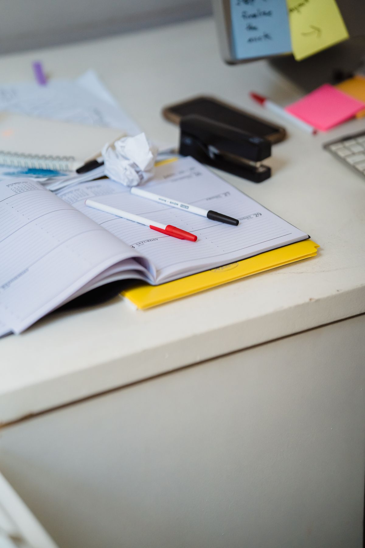 Paper and stationery on a desk