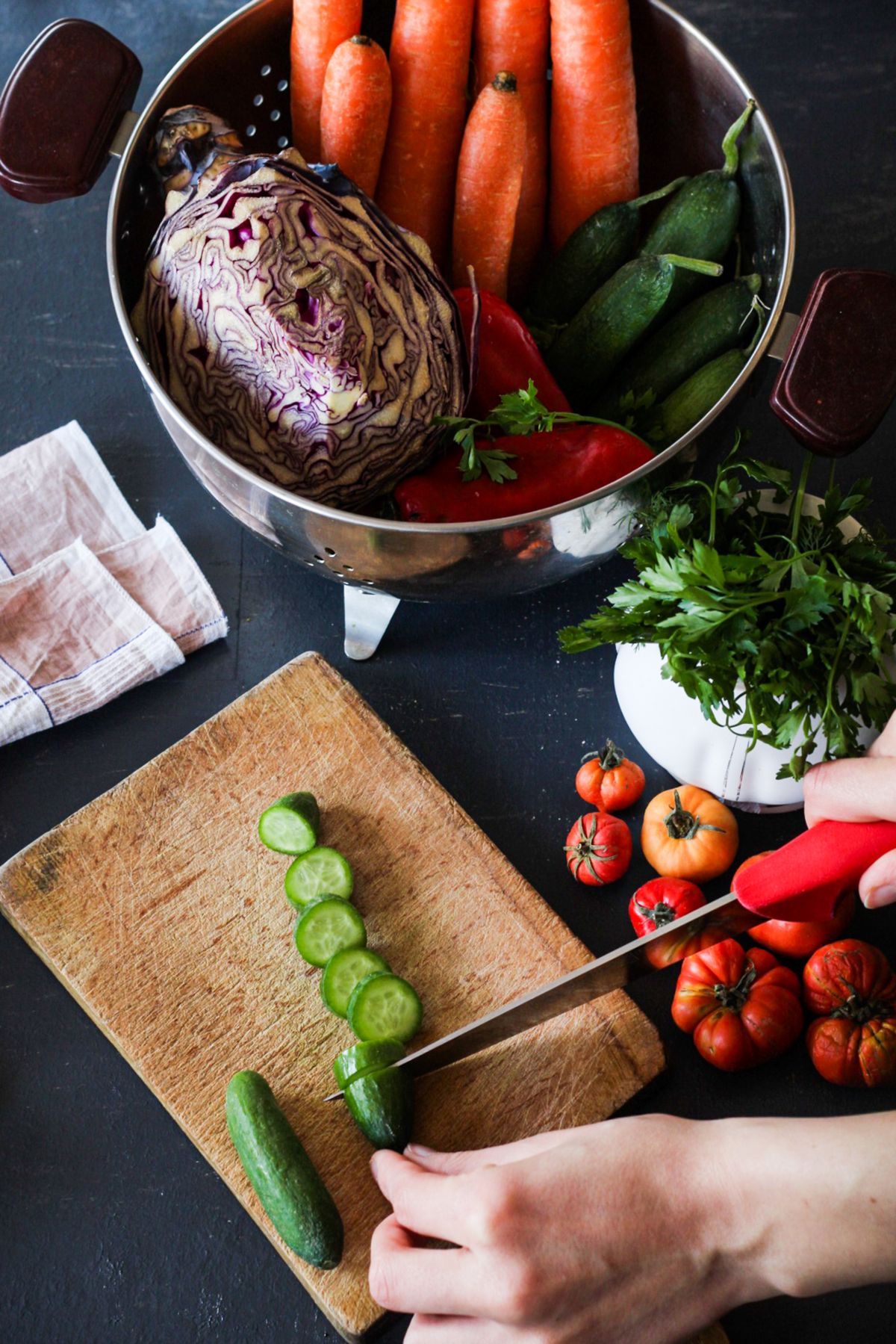 Fresh vegetables being prepared on a chopping board
