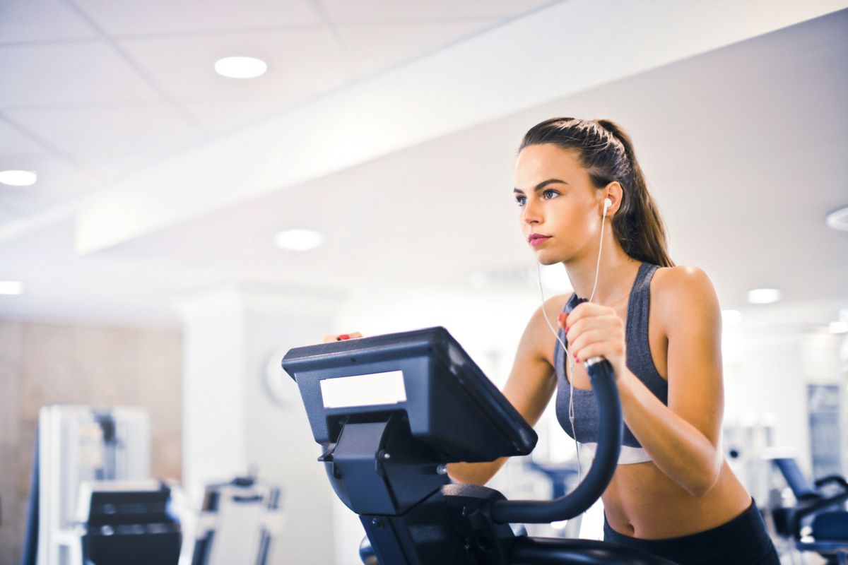 A person using indoor exercise equipment